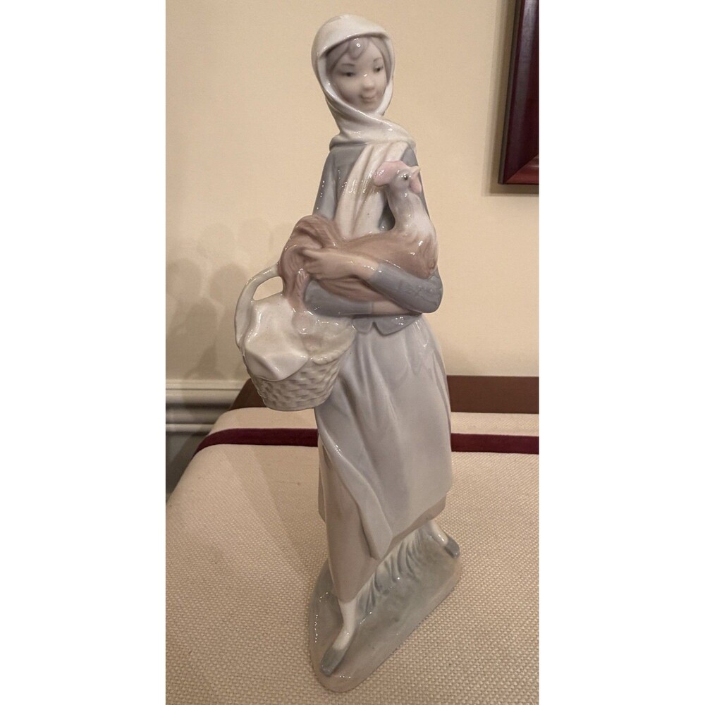 Lladró "Girl with Cockerel" porcelain figurine, model #4591 Retired